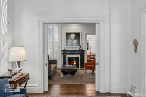 a living room with furniture workspace and a window