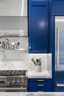 a bathroom with a double vanity sink mirror and double
