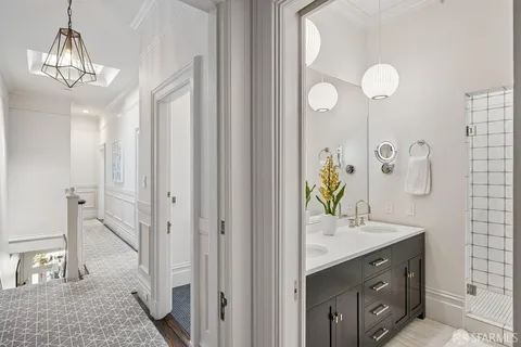 a view of a house with a potted plant and a potted plant