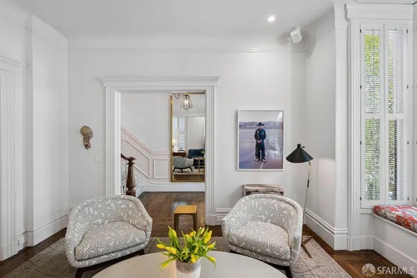 a living room with furniture and a window