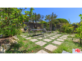 29500 Heathercliff Road, Unit 178 Malibu, CA 90265 - Photo 11 of 35 a picture of a house with a yard