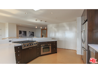 29500 Heathercliff Road, Unit 178 Malibu, CA 90265 - Photo 20 of 35 a kitchen with a sink and stainless steel appliances