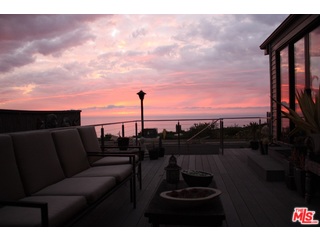 29500 Heathercliff Road, Unit 178 Malibu, CA 90265 - Photo 3 of 35 a view of a terrace with sitting space