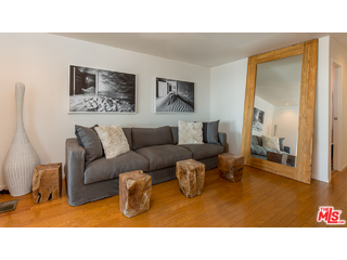 29500 Heathercliff Road, Unit 178 Malibu, CA 90265 - Photo 24 of 35 a living room with furniture and a flat screen tv