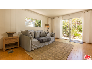 29500 Heathercliff Road, Unit 178 Malibu, CA 90265 - Photo 25 of 35 a living room with furniture and a window