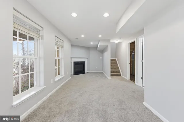 a view of a livingroom with a staircase
