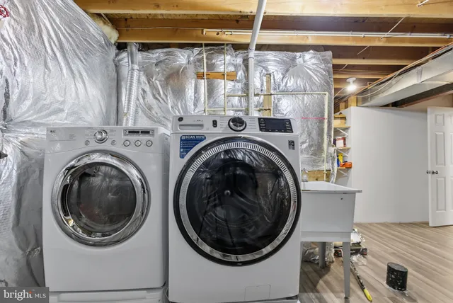a utility room with dryer and washer