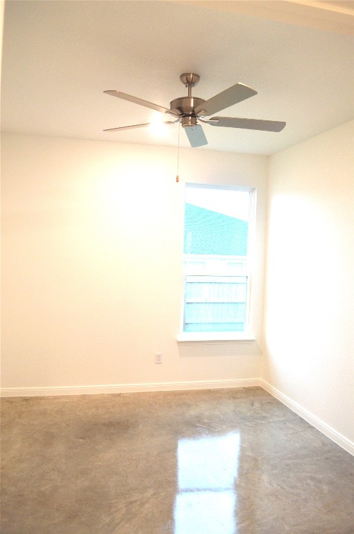 2919 Wildcat Rdg Road, Unit A Temple, TX 76501 - Photo 10 of 22 Empty room featuring concrete flooring and ceiling fan