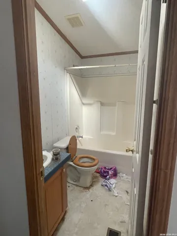 a bathroom with a bathtub and shower