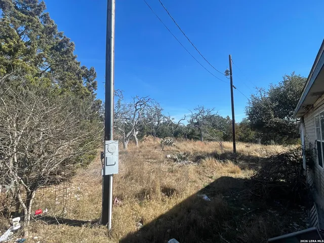 a view of a wooden deck and a lake view