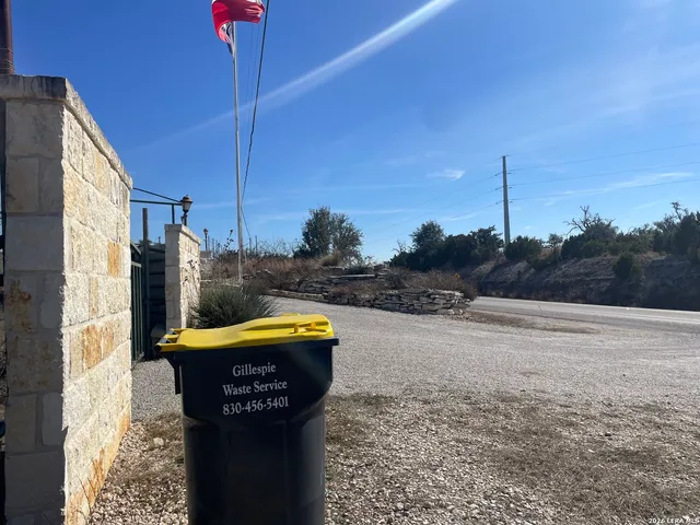 a view of lake from under an umbrella