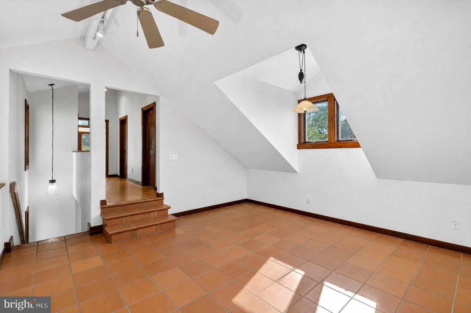 498 Perrineville Road Robbinsville, NJ 08691 - Photo 39 of 59 an empty room with staircase