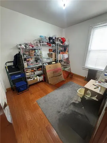 a bedroom with furniture and a bed