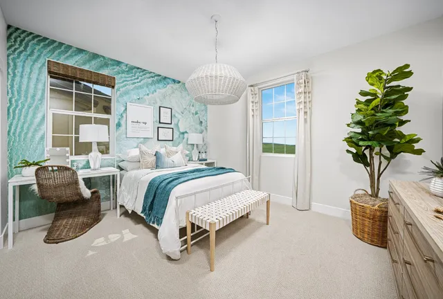 a bedroom with bed and a window