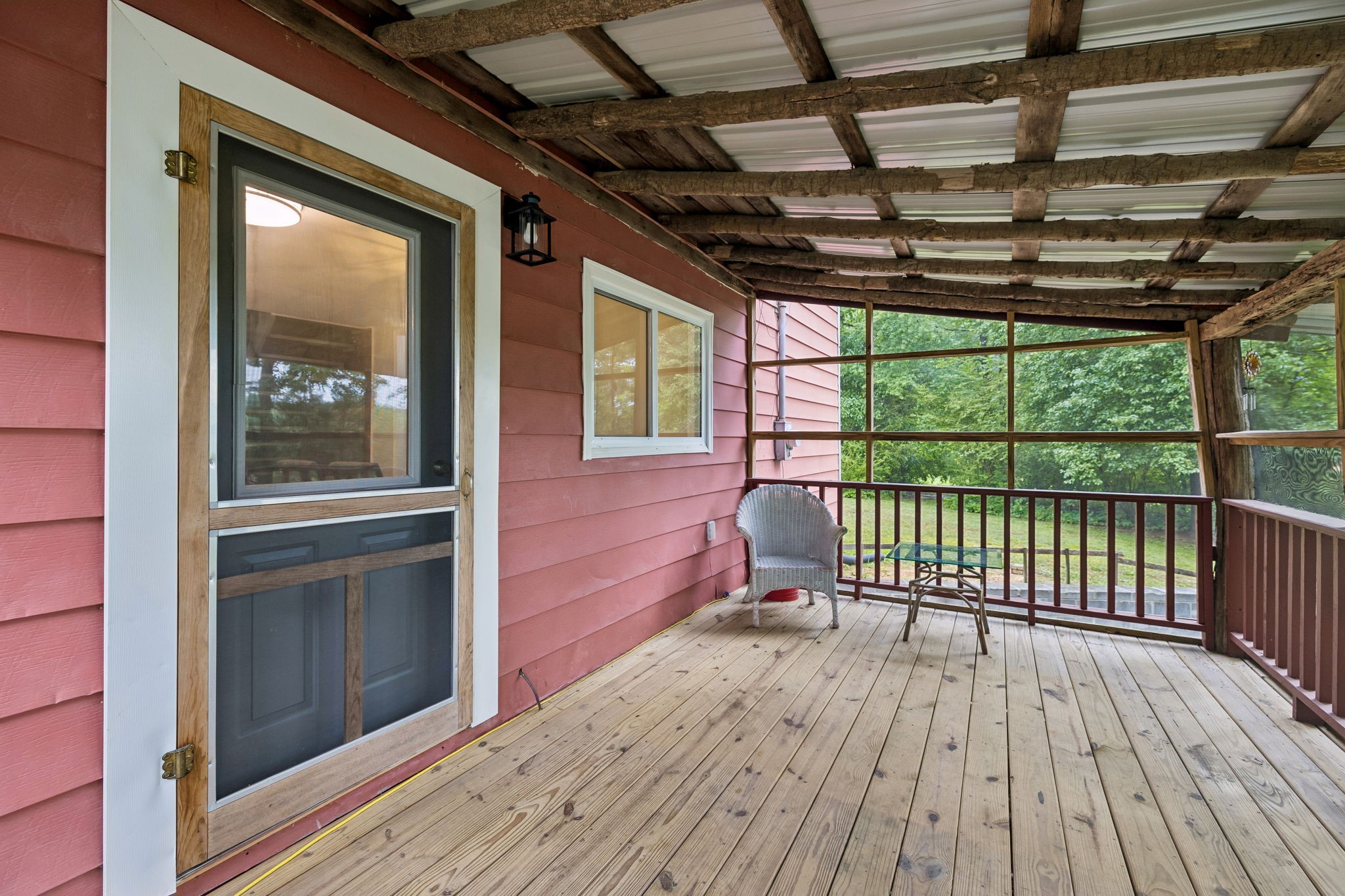 121 Hannah Road Summertown, TN 38483 - Photo 37 of 52 a view of a porch with wooden floor