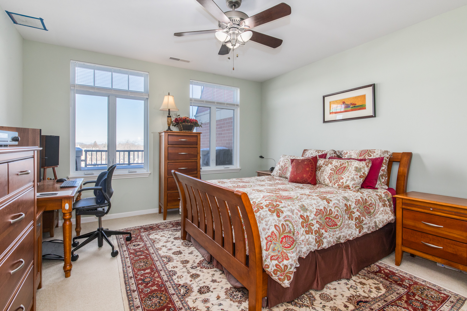 120 North Northwest Highway, Unit 506 Park Ridge, IL 60068 - Photo 12 of 20 a bedroom with a bed and wooden floor