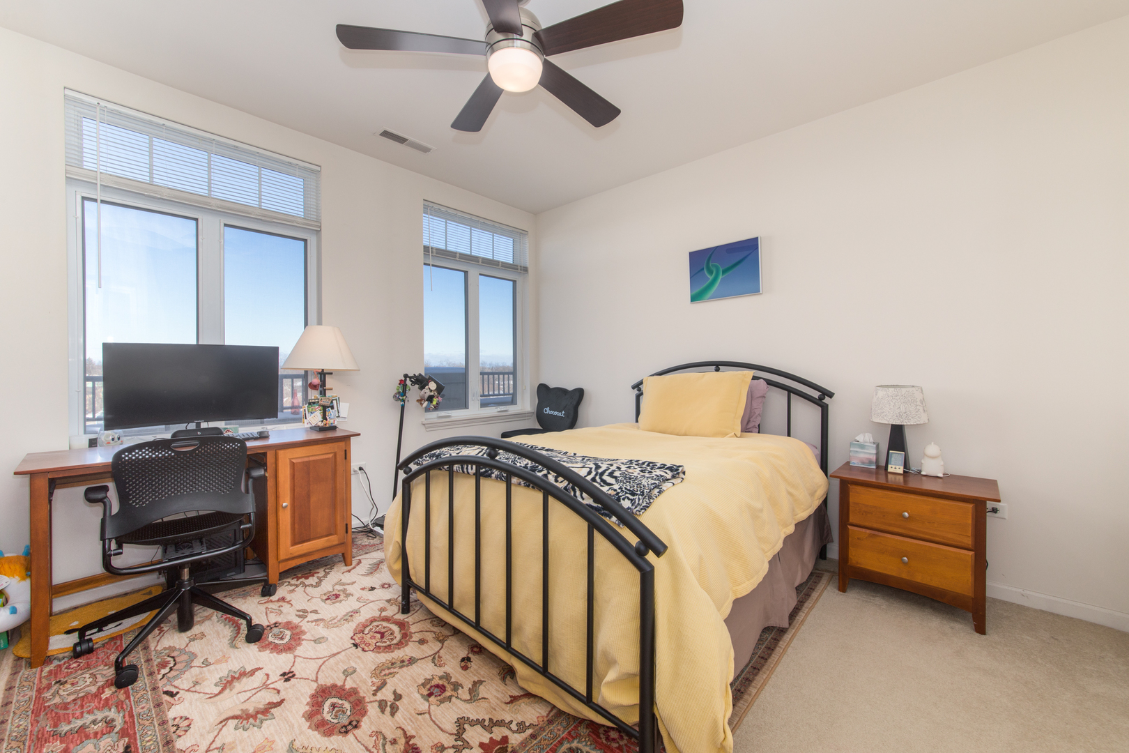 120 North Northwest Highway, Unit 506 Park Ridge, IL 60068 - Photo 14 of 20 a bedroom with a bed and a flat screen tv