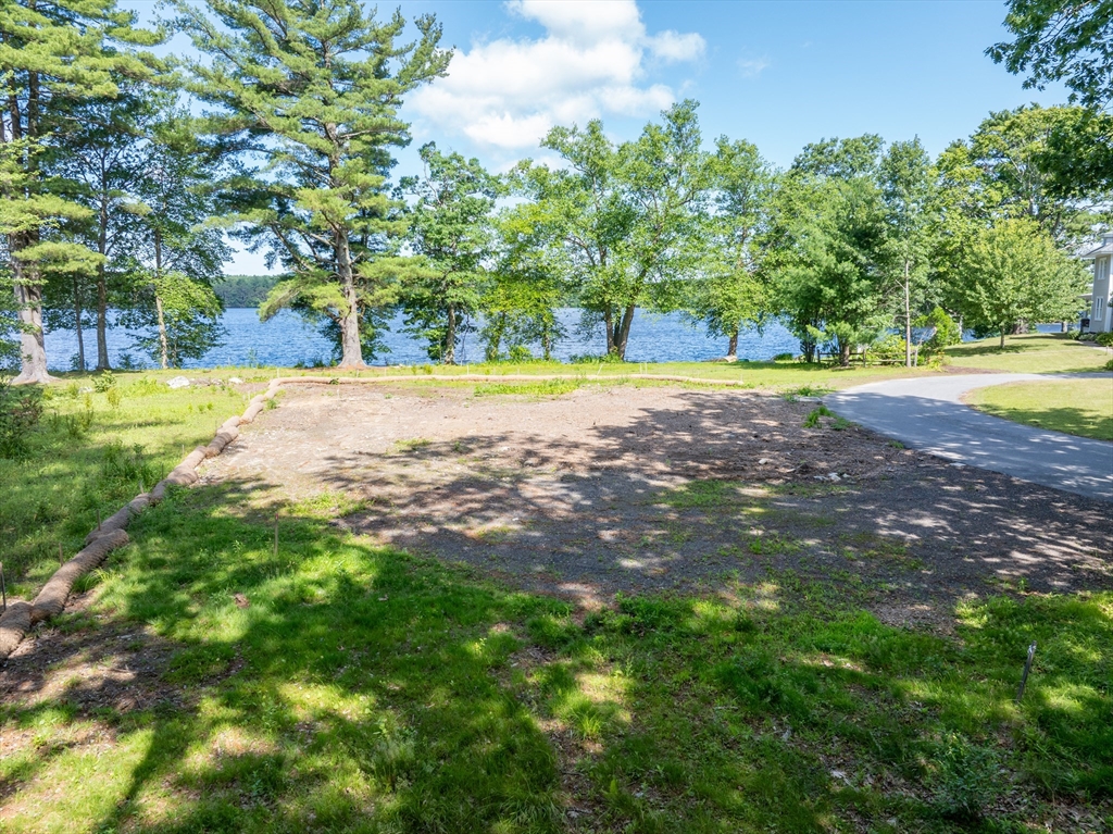 14 Geneva Road Andover, MA 01810 - Photo 22 of 36 a view of a yard with a large trees