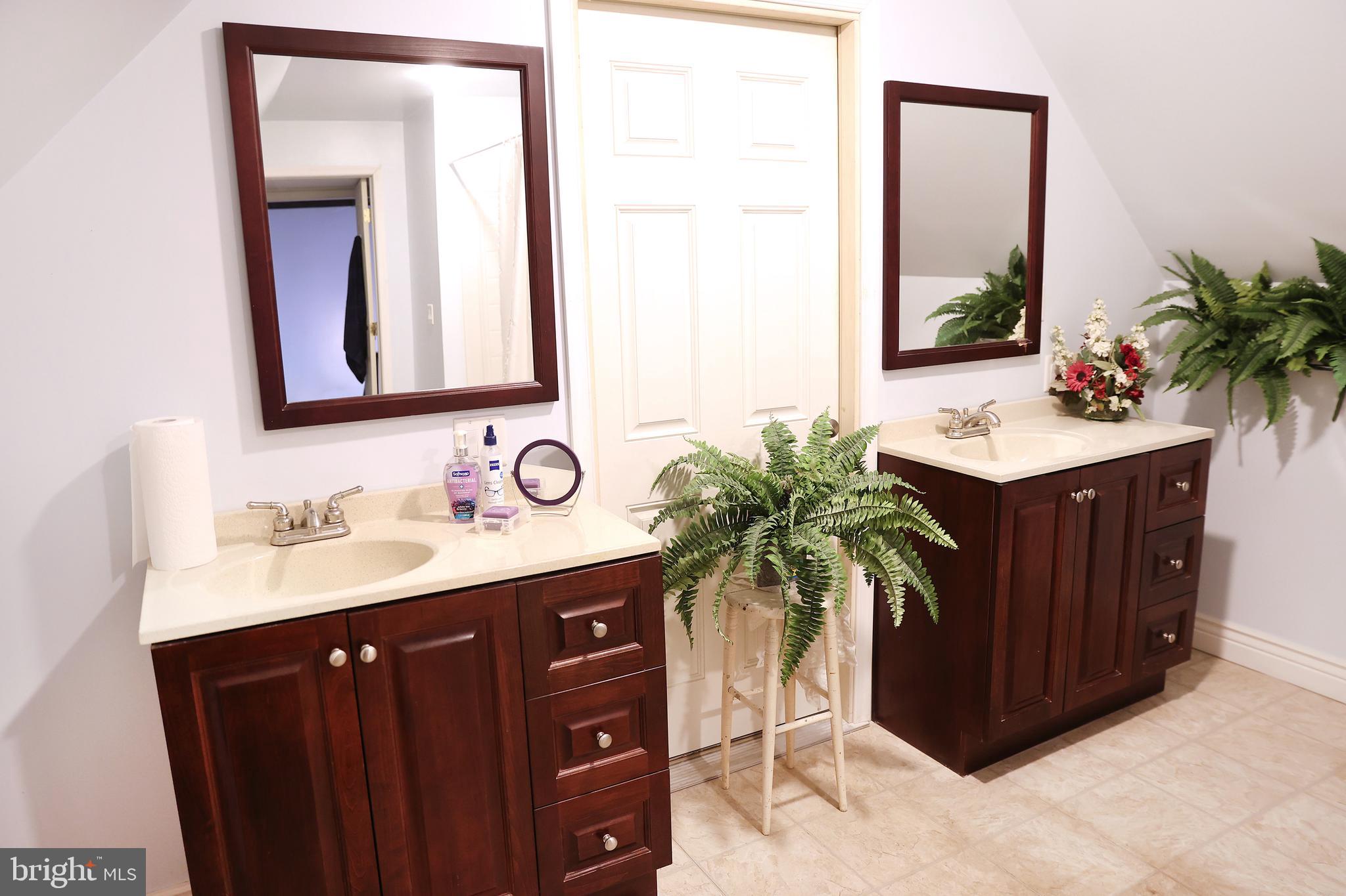 57 Fairview Road Belleville, PA 17004 - Photo 15 of 36 a bathroom with a sink and a mirror