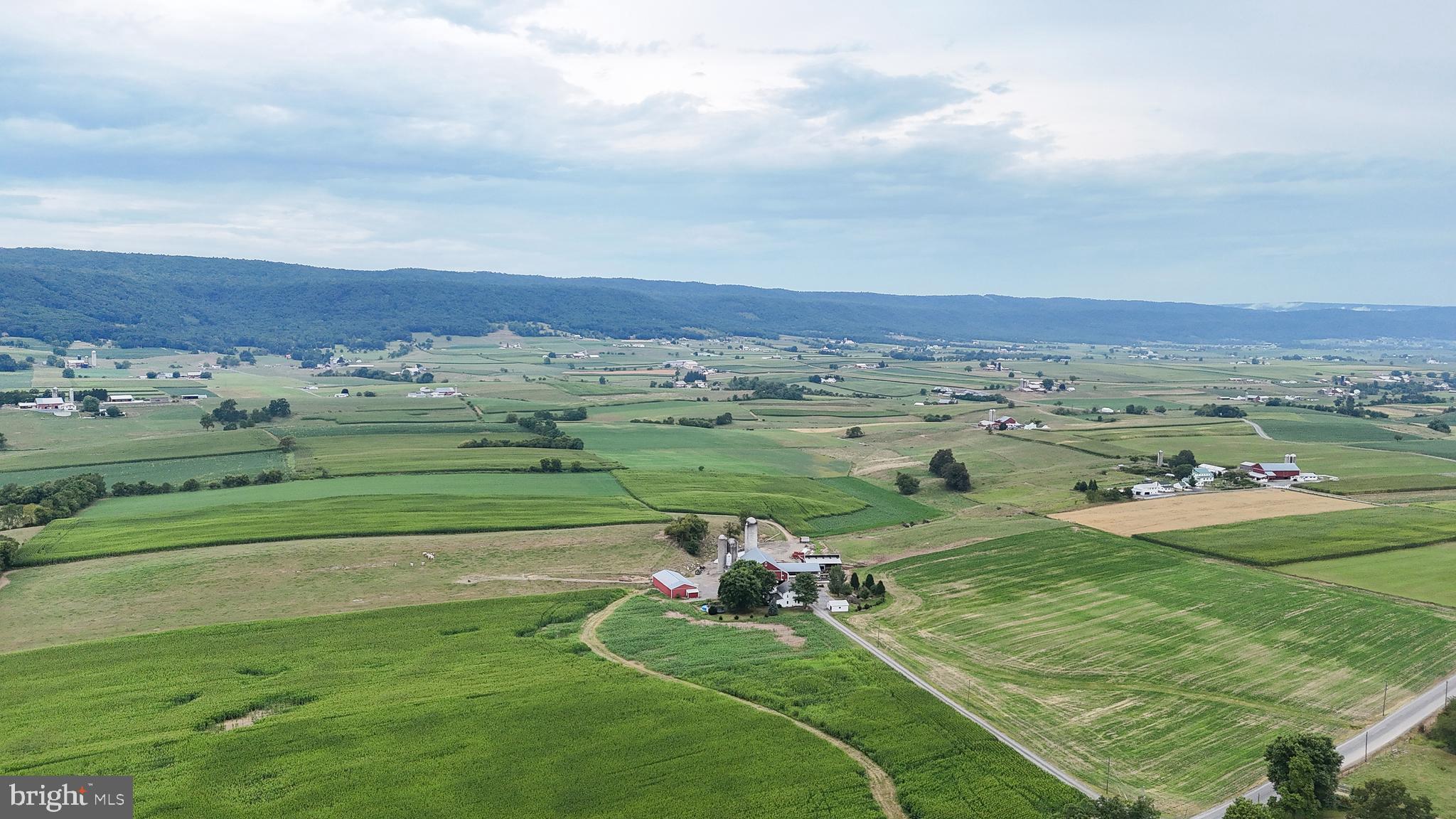 57 Fairview Road Belleville, PA 17004 - Photo 21 of 36 a view of a golf course with a big yard