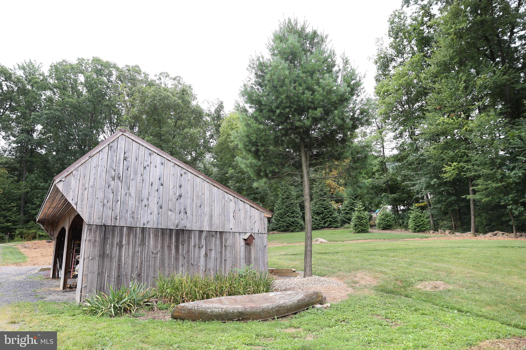 57 Fairview Road Belleville, PA 17004 - Photo 25 of 36 a view of a house with backyard and a tree