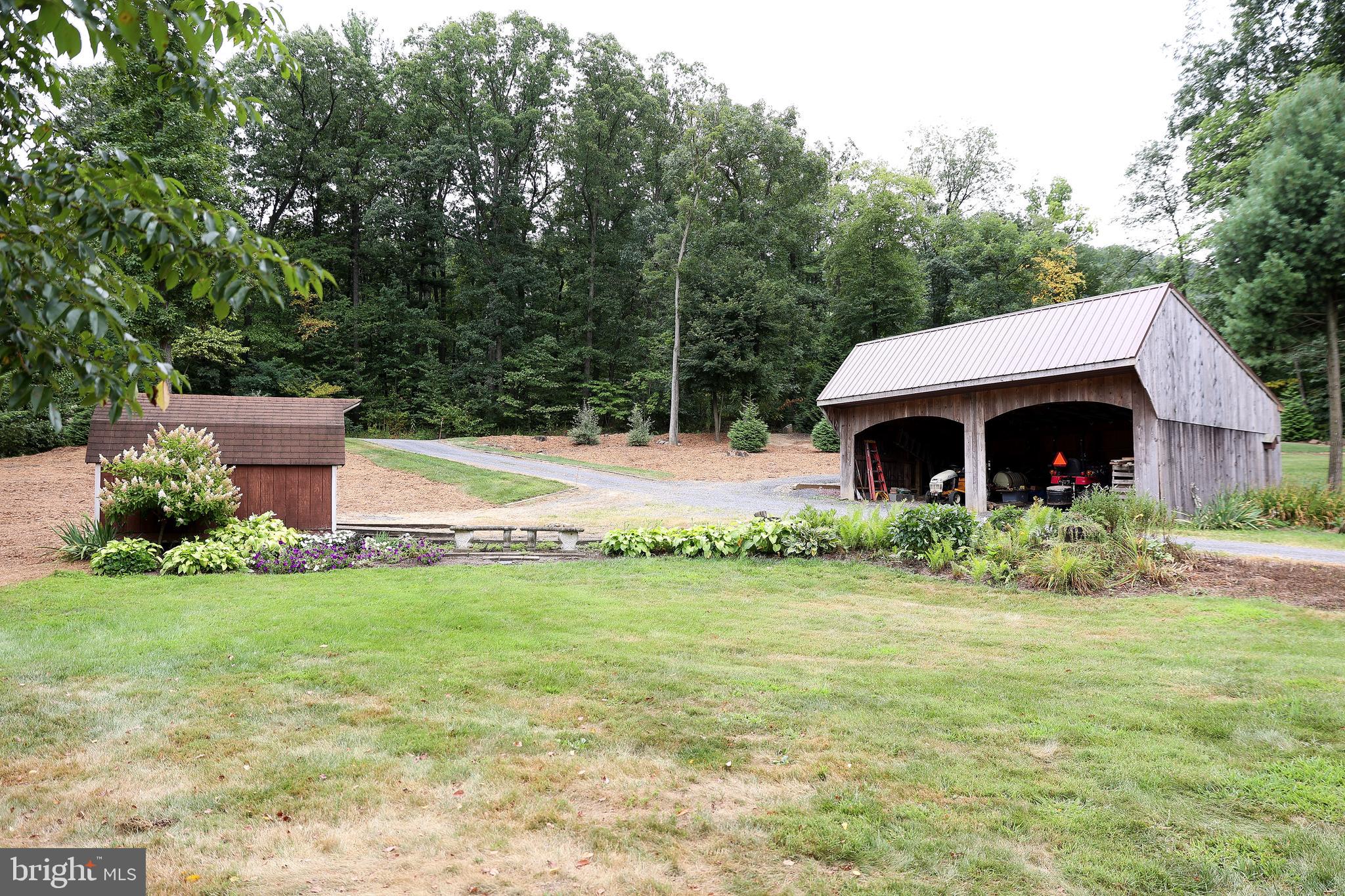 57 Fairview Road Belleville, PA 17004 - Photo 26 of 36 a front view of a house with garden