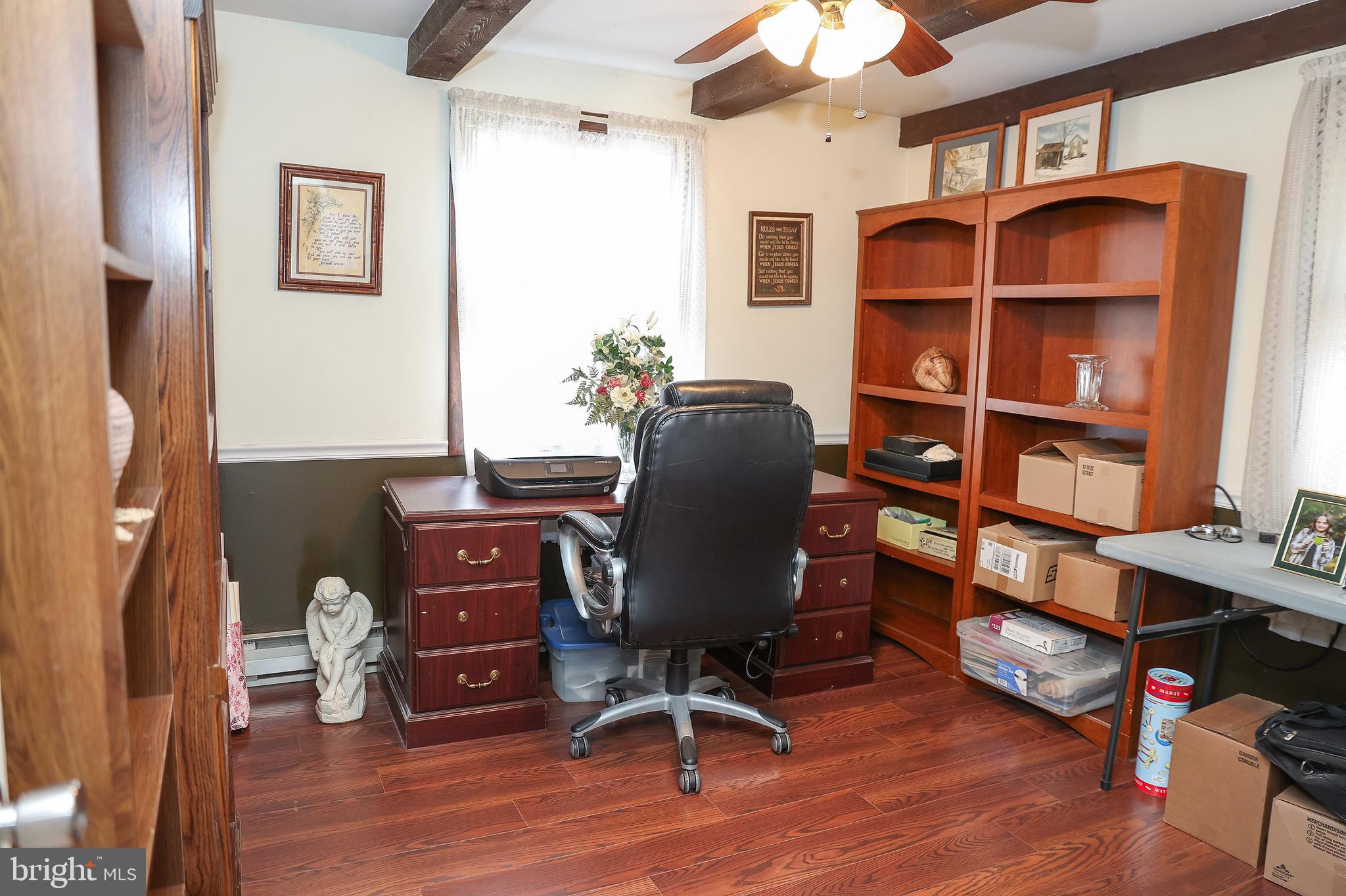 57 Fairview Road Belleville, PA 17004 - Photo 32 of 36 a view of a workspace with furniture and wooden floor