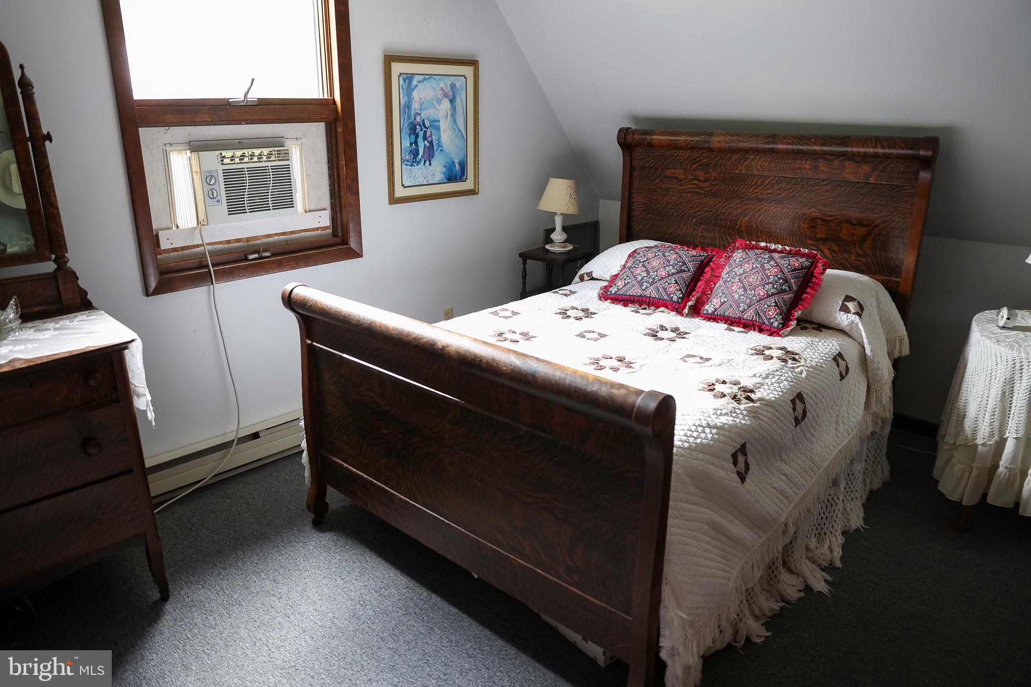 57 Fairview Road Belleville, PA 17004 - Photo 33 of 36 a bedroom with a bed and a window