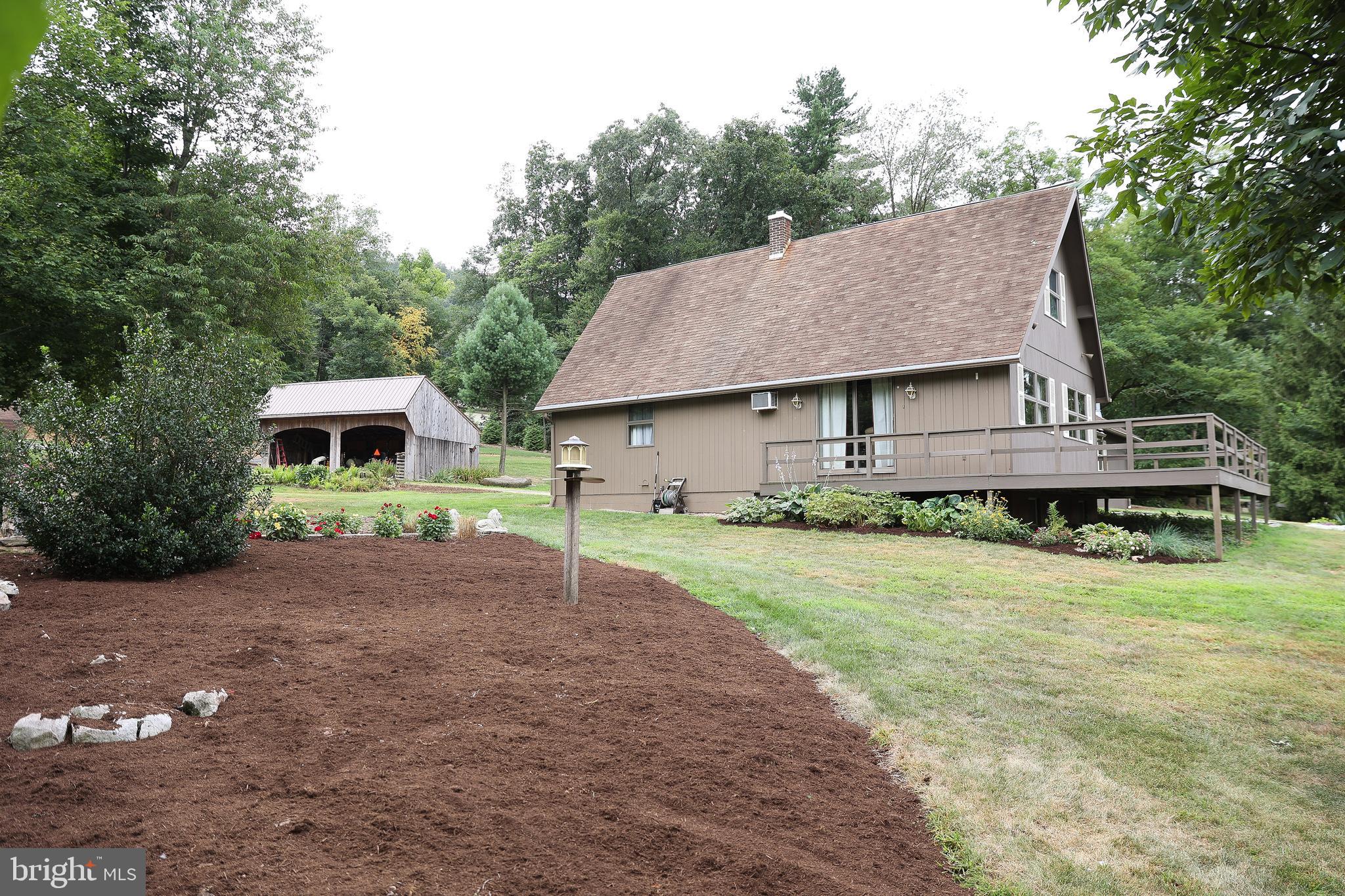 57 Fairview Road Belleville, PA 17004 - Photo 10 of 36 a aerial view of a house with yard and a tree