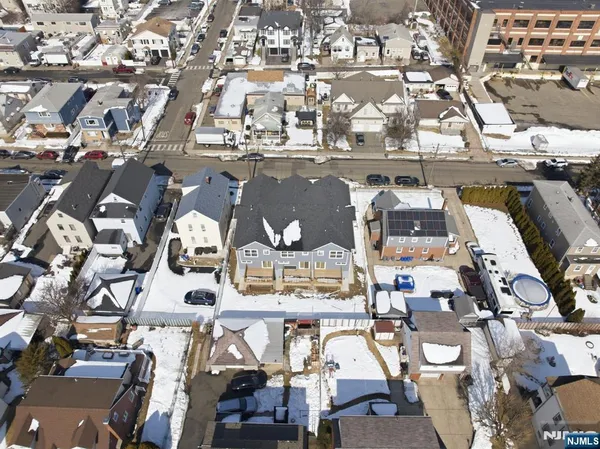 an aerial view of a room with lots of residential buildings