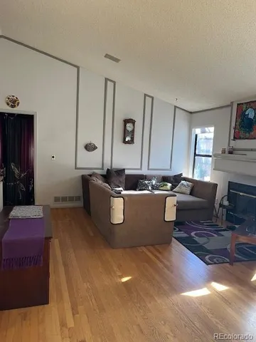 a living room with furniture and a couch