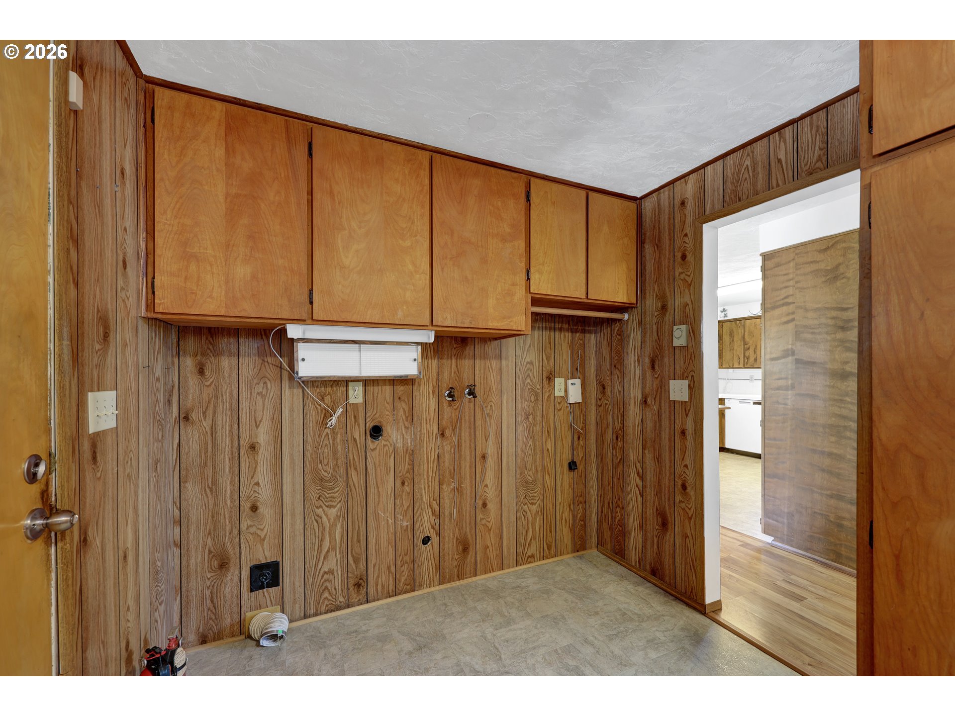 1425 Taney Street Eugene, OR 97402 - Photo 16 of 34 a view of an empty room and wooden floor