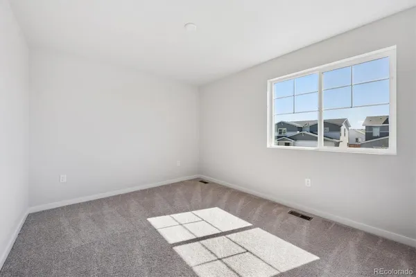 a view of small space with wooden floor