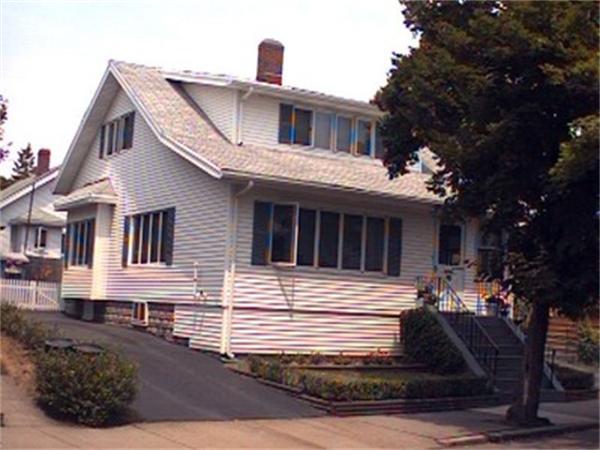 68 Baker Road Everett, MA 02149 - Photo 1 of 1 a front view of a house with a yard