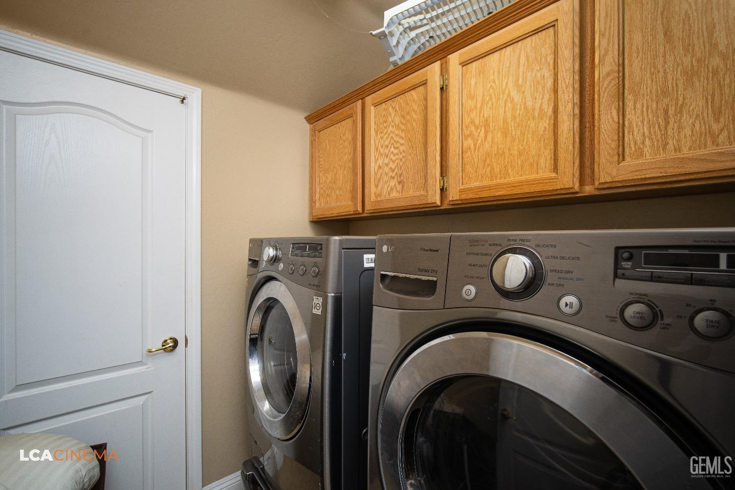 Undisclosed Address Bakersfield, CA 93311 - Photo 14 of 43 a utility room with dryer and washer