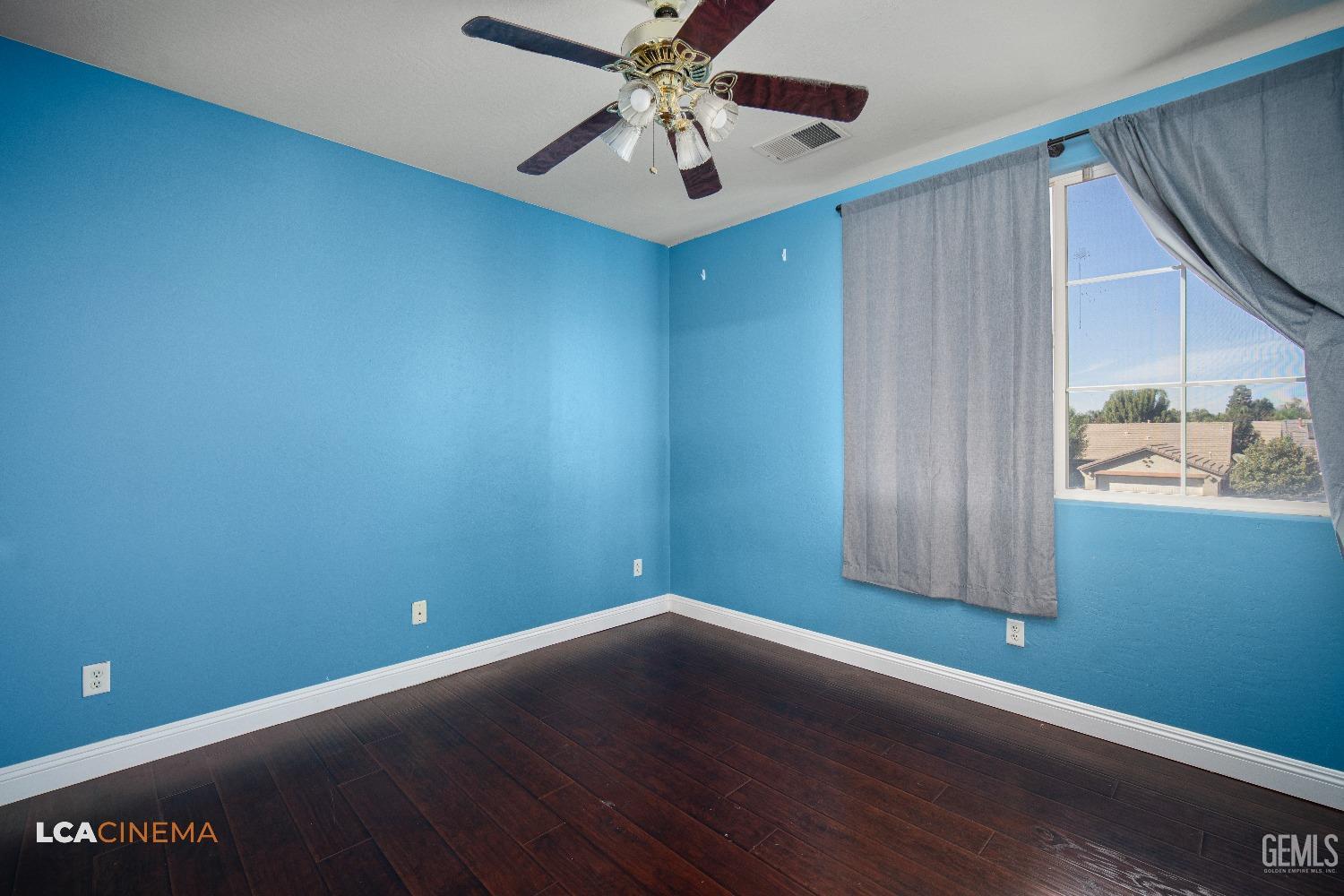 Undisclosed Address Bakersfield, CA 93311 - Photo 16 of 43 a view of an empty room with window and cabinet