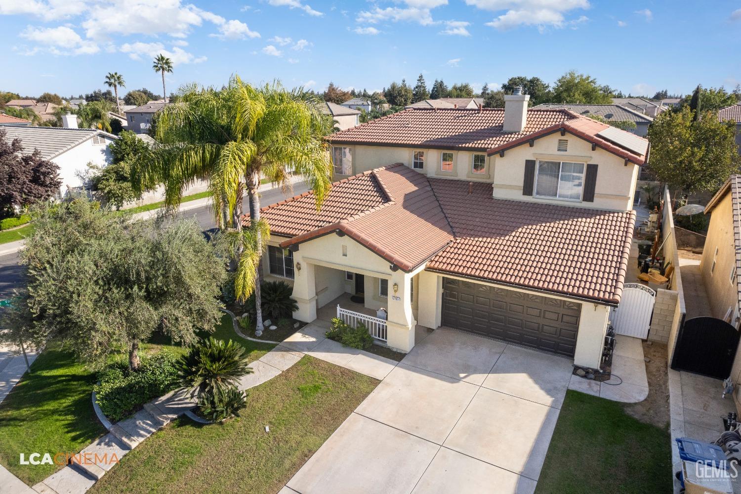 Undisclosed Address Bakersfield, CA 93311 - Photo 35 of 43 a view of a house with a yard