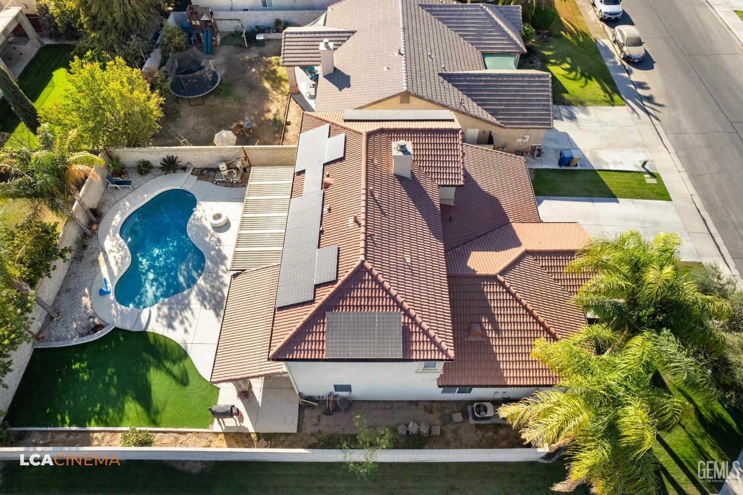 Undisclosed Address Bakersfield, CA 93311 - Photo 38 of 43 an aerial view of a house with a yard