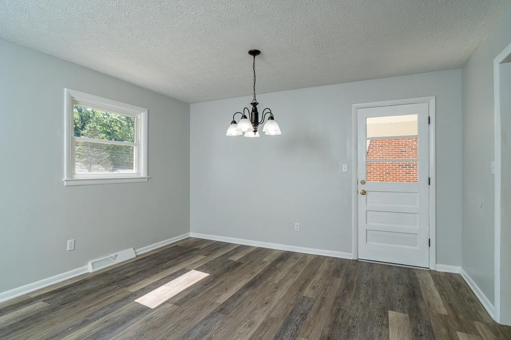 120 Robinhood Road Staunton, VA 24401 - Photo 8 of 38 a view of empty room with wooden floor and fan