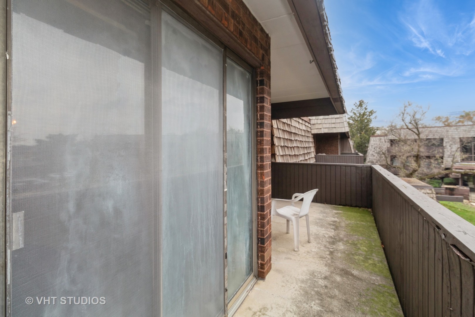 511 Timber Ridge Drive, Unit 304C Carol Stream, IL 60188 - Photo 11 of 12 a balcony with view of living room