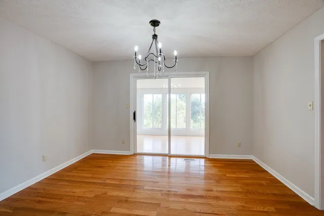 a view of a livingroom with wooden floor