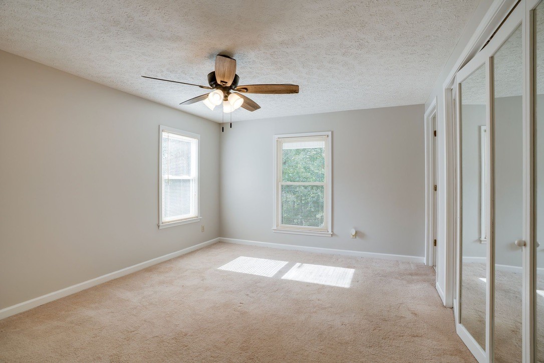418 Spout Spring Road Dover, TN 37058 - Photo 18 of 36 a view of an empty room with a window