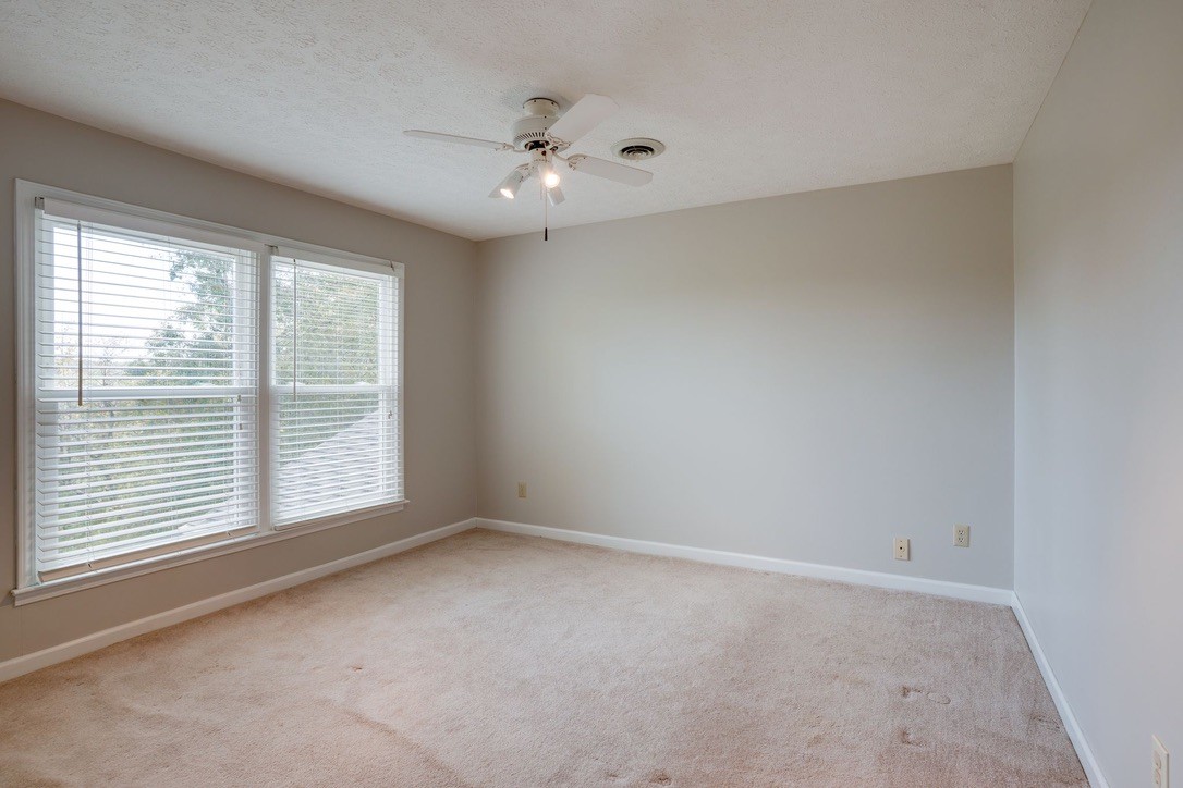 418 Spout Spring Road Dover, TN 37058 - Photo 22 of 36 a view of an empty room with a window