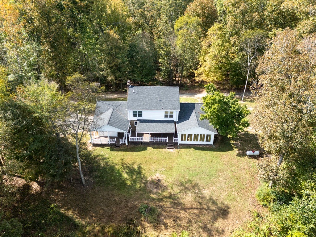 418 Spout Spring Road Dover, TN 37058 - Photo 32 of 36 an aerial view of a house with swimming pool and large trees