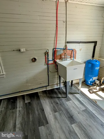 a view of balcony with wooden floor