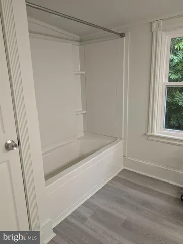 a bathroom with a bathtub