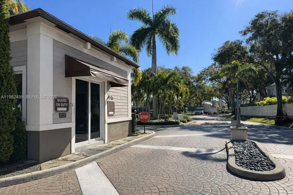 a sign that is next to a road