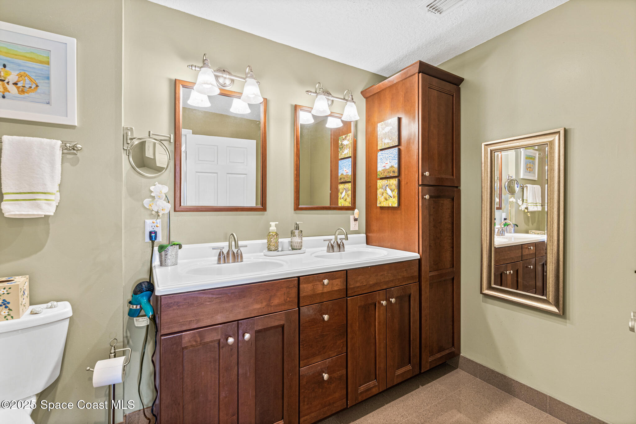 300 South Banana River Boulevard, Unit 301 Cocoa Beach, FL 32931 - Photo 13 of 44 Dual Sinks in Primary Bathroom