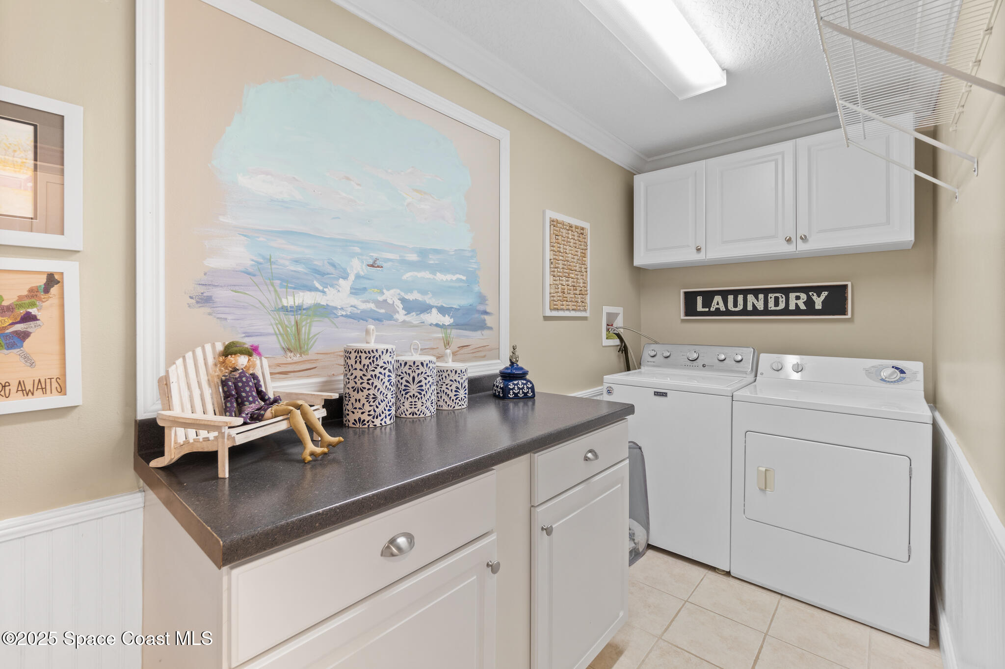 300 South Banana River Boulevard, Unit 301 Cocoa Beach, FL 32931 - Photo 17 of 44 Laundry Room