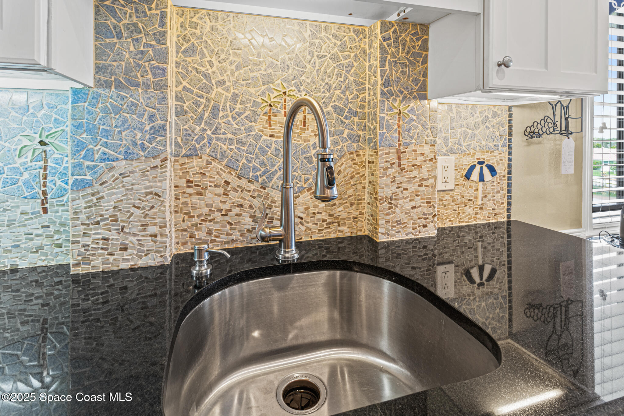 300 South Banana River Boulevard, Unit 301 Cocoa Beach, FL 32931 - Photo 20 of 44 Custom Beach-Inspired Backsplash